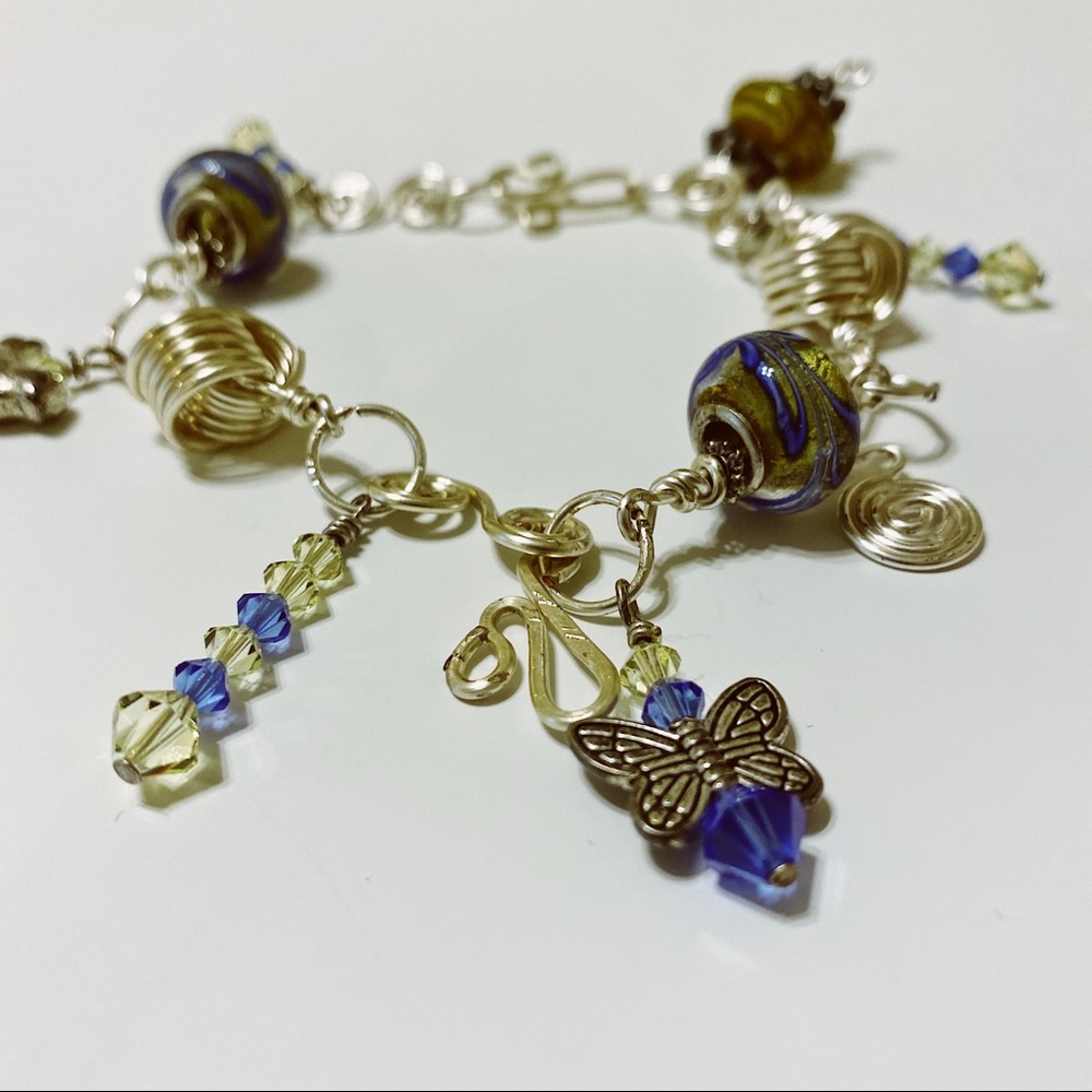 Silver Bracelet with Butterfly and Bird Accents